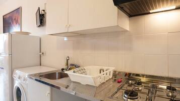 Standard Studio, Partial Sea View | Private kitchenette | Full-sized fridge