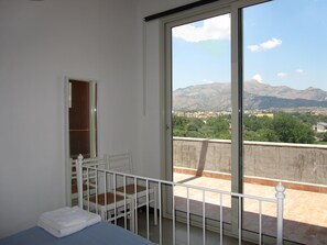 Standard Apartment, 1 Bedroom, Partial Sea View | Premium bedding, iron/ironing board, cots/infant beds, free WiFi