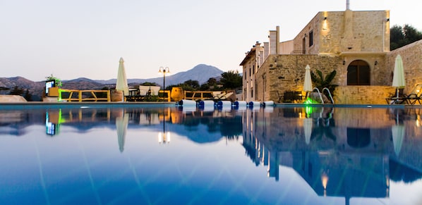 Outdoor pool, pool umbrellas, pool loungers