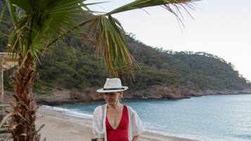 Guests can enjoy a serene beach experience with access to the ocean.