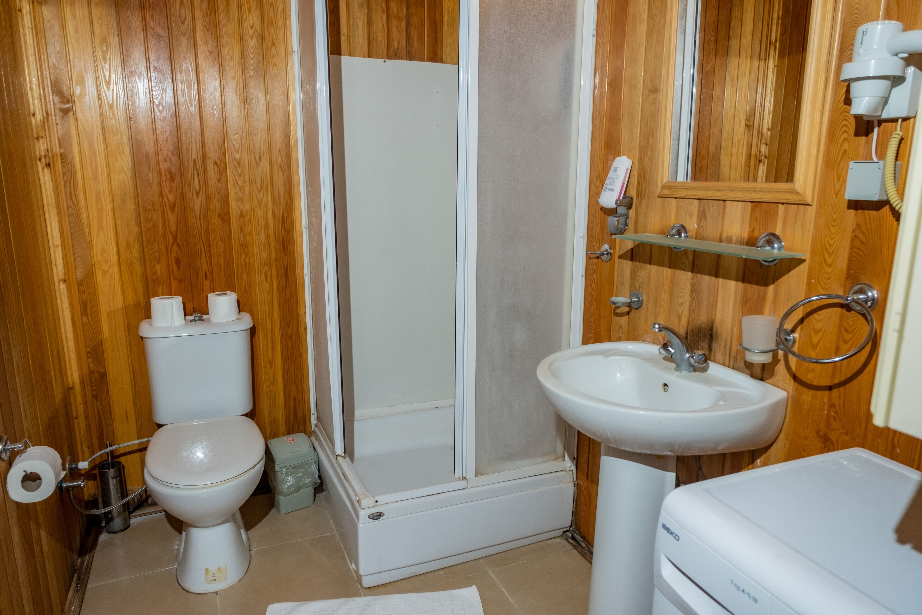 exclusive house | bathroom | shower, hair dryer, slippers, towels