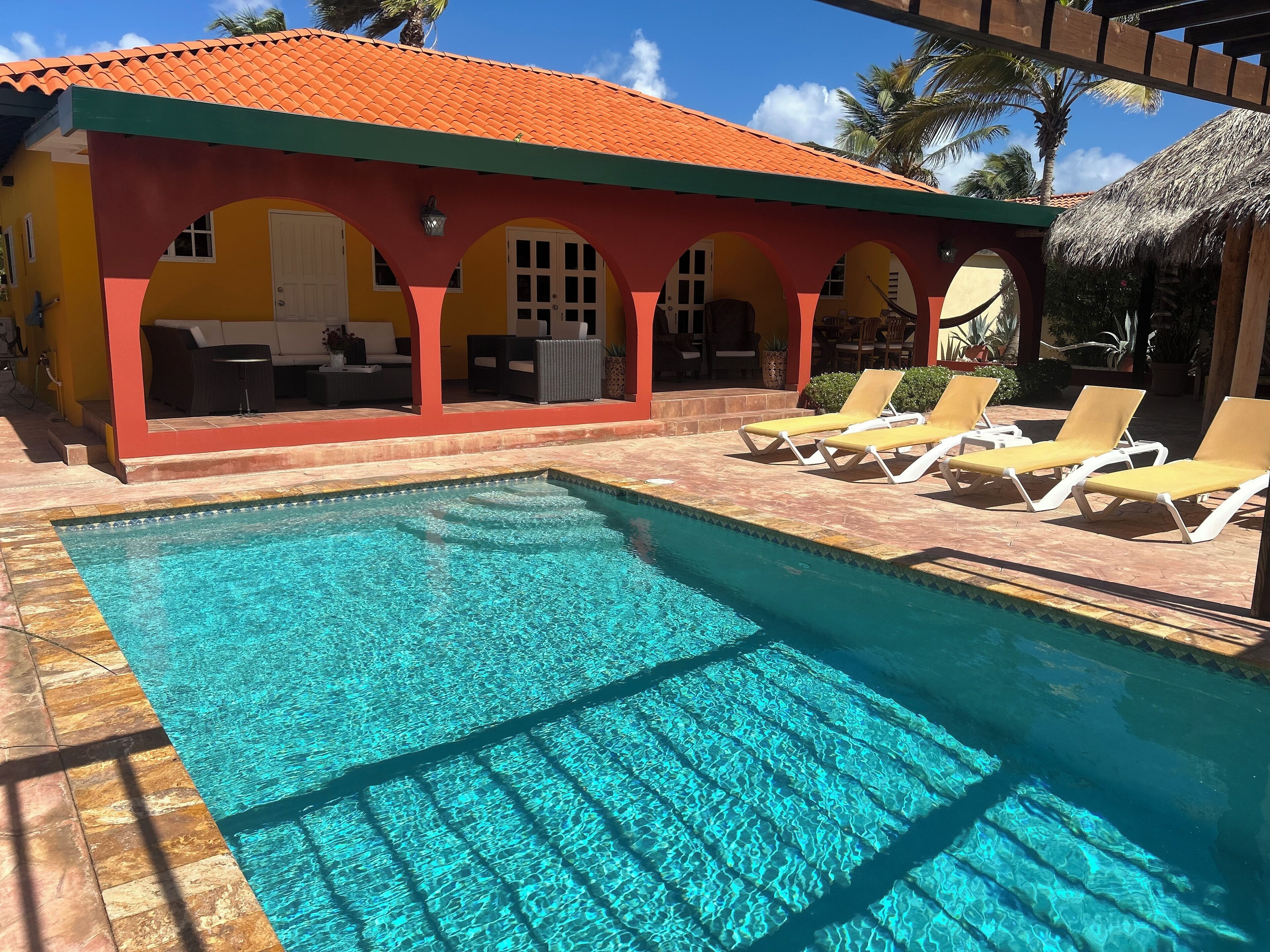 Outdoor pool, a heated pool, sun loungers