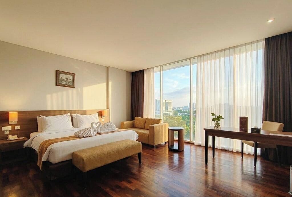 Suite junior | Caja fuerte, wifi gratis, ropa de cama y accesible en silla de ruedas