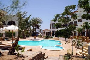 Outdoor pool, pool umbrellas, pool loungers
