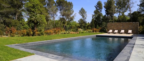 Outdoor pool, pool umbrellas, sun loungers