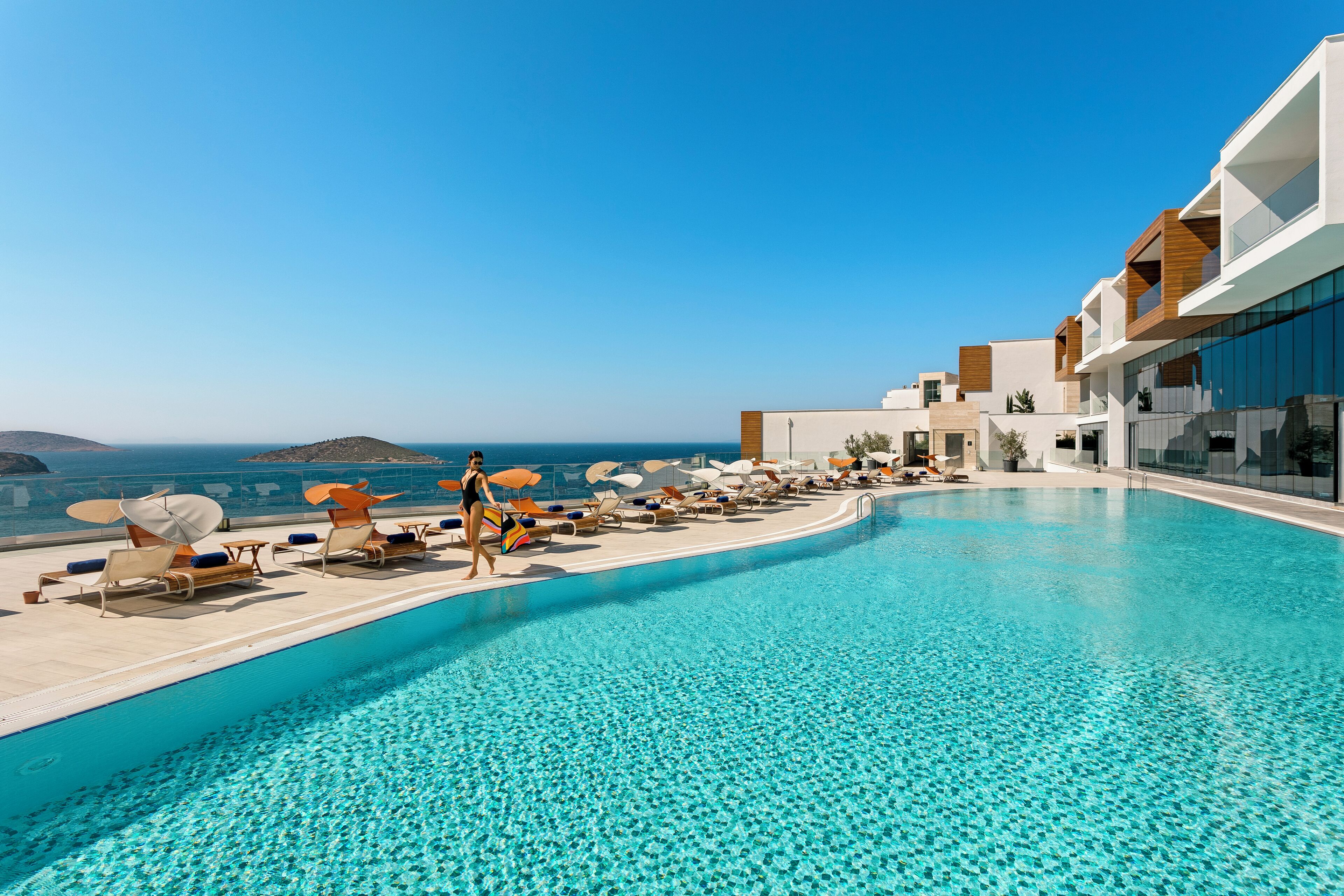 indoor pool, seasonal outdoor pool, pool umbrellas, pool loungers