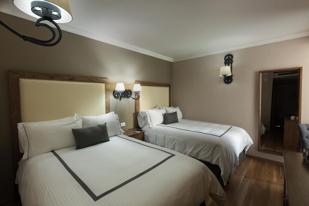 Premium bedding, down duvets, in-room safe, desk