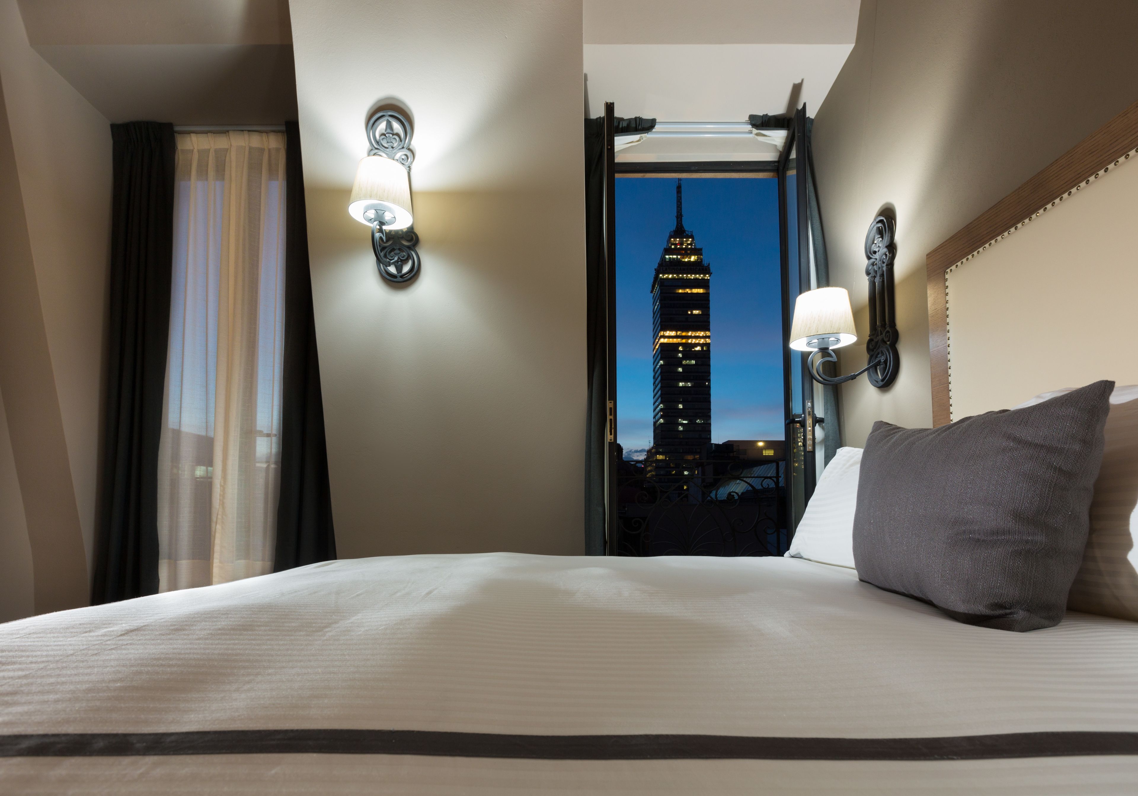 Premium bedding, down comforters, in-room safe, desk