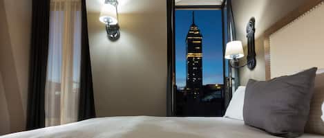 Premium bedding, down comforters, in-room safe, desk