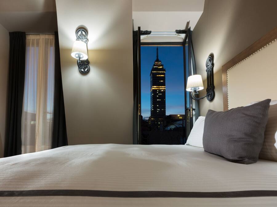 Premium bedding, down comforters, in-room safe, desk