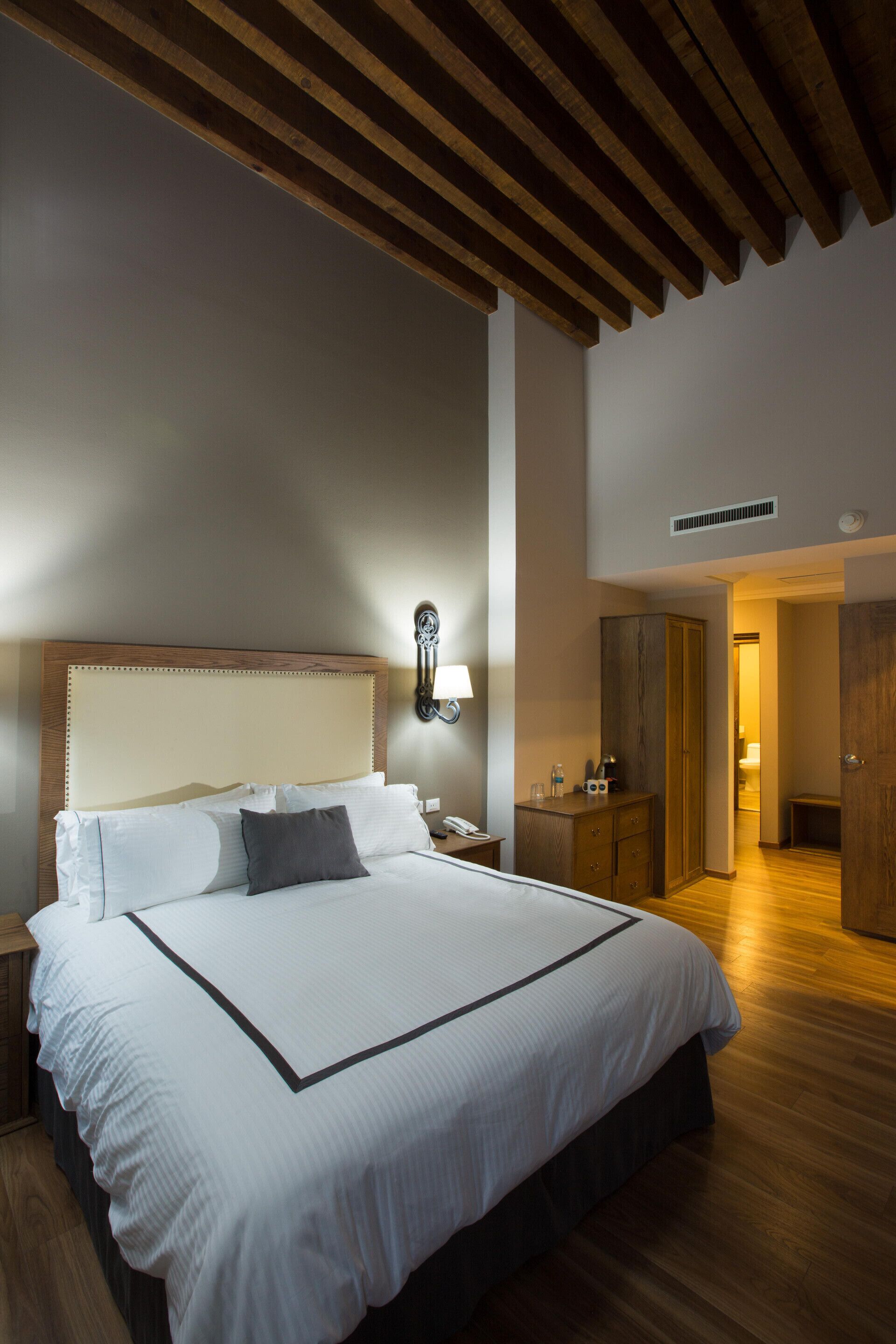 Premium bedding, down duvets, in-room safe, desk