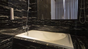Executive Suite | Bathroom | Hair dryer, bidet, towels