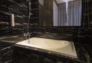 Executive Suite | Bathroom | Hair dryer, bidet, towels