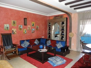 Appartement supérieur | Salle de séjour | Téléviseur à écran plat, lecteur de DVD