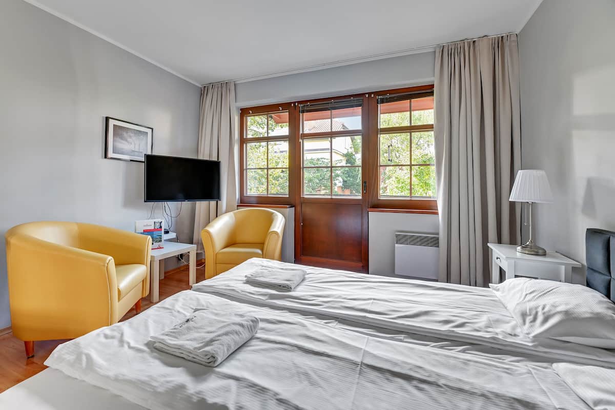 Apartamento, sacada, ao lado da praia | Ferros/tábuas de passar roupa, berços (sobretaxa), Wi-Fi de cortesia