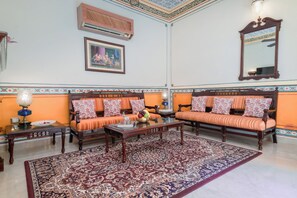 Haveli Suite | Living area | 42-inch LED TV with satellite channels, TV, ping pong