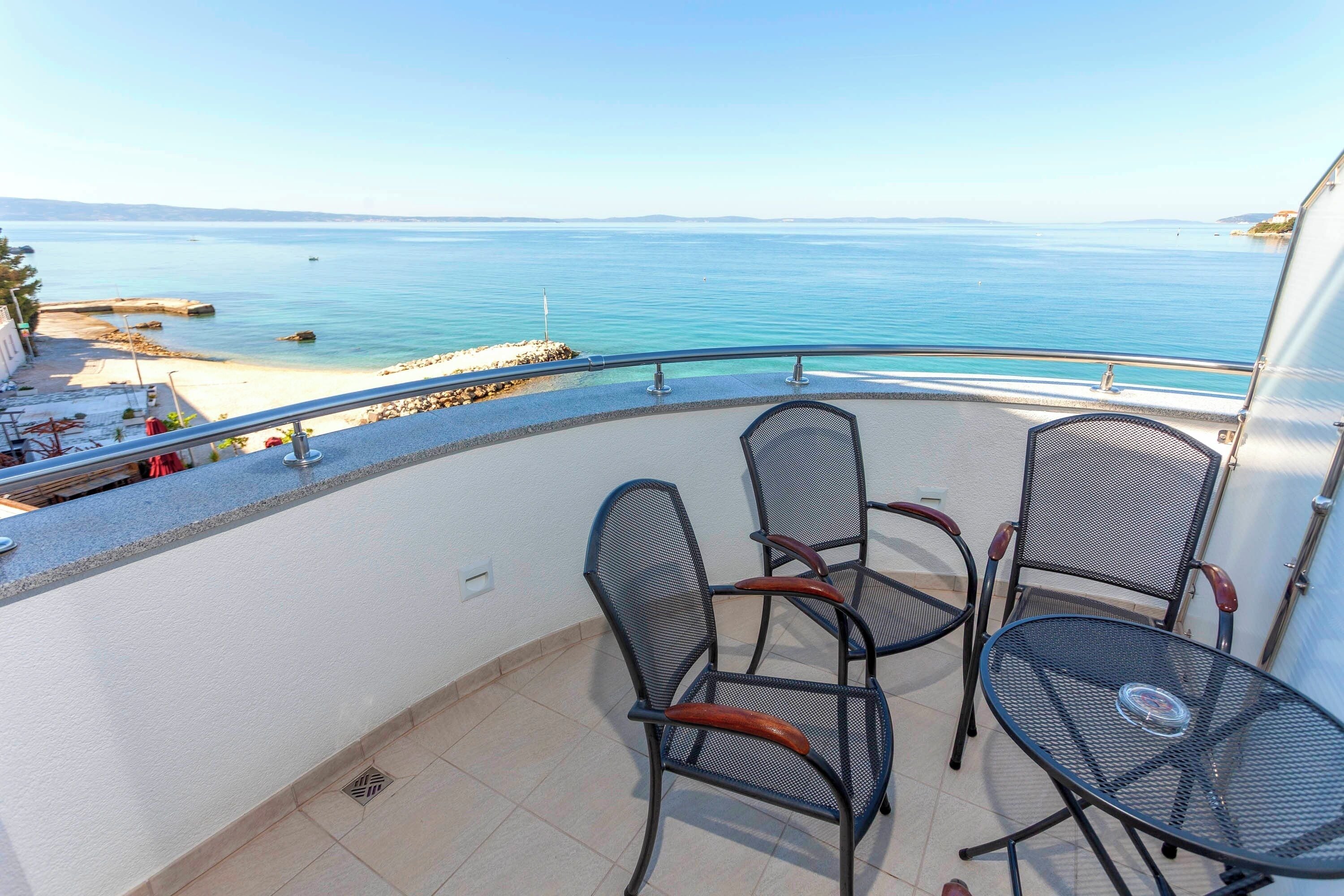 Chambre Quadruple, balcon, vue mer | Vue sur la plage/l’océan