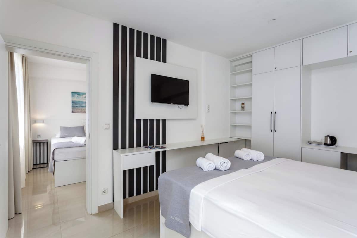 Quadruple Room, 2 Bedrooms, Balcony, Sea View | Blackout drapes, iron/ironing board, cribs/infant beds, free WiFi