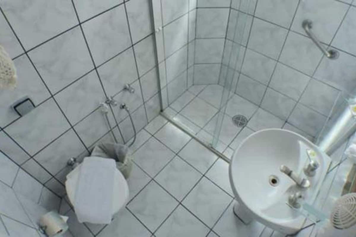 standard room, 3 single beds | bathroom | shower, rainfall showerhead, hair dryer, towels