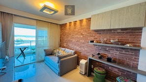 Apartment | Living area | 32-inch flat-screen TV with digital channels, Smart TV, Netflix
