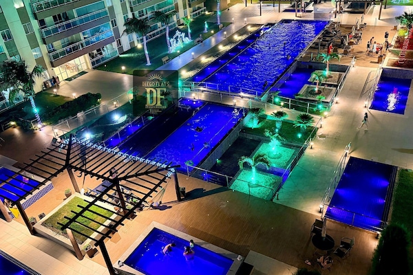4 outdoor pools, pool umbrellas, sun loungers