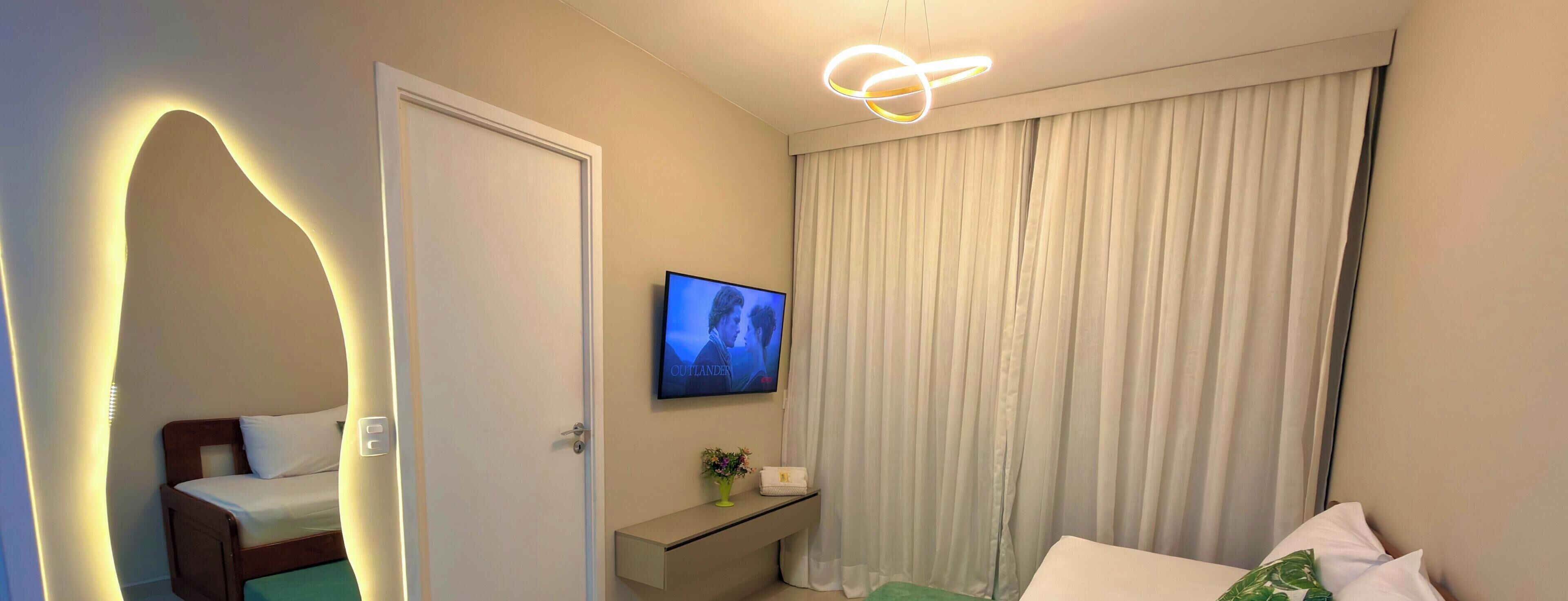 Smart TV, Netflix, mesa de ping pong