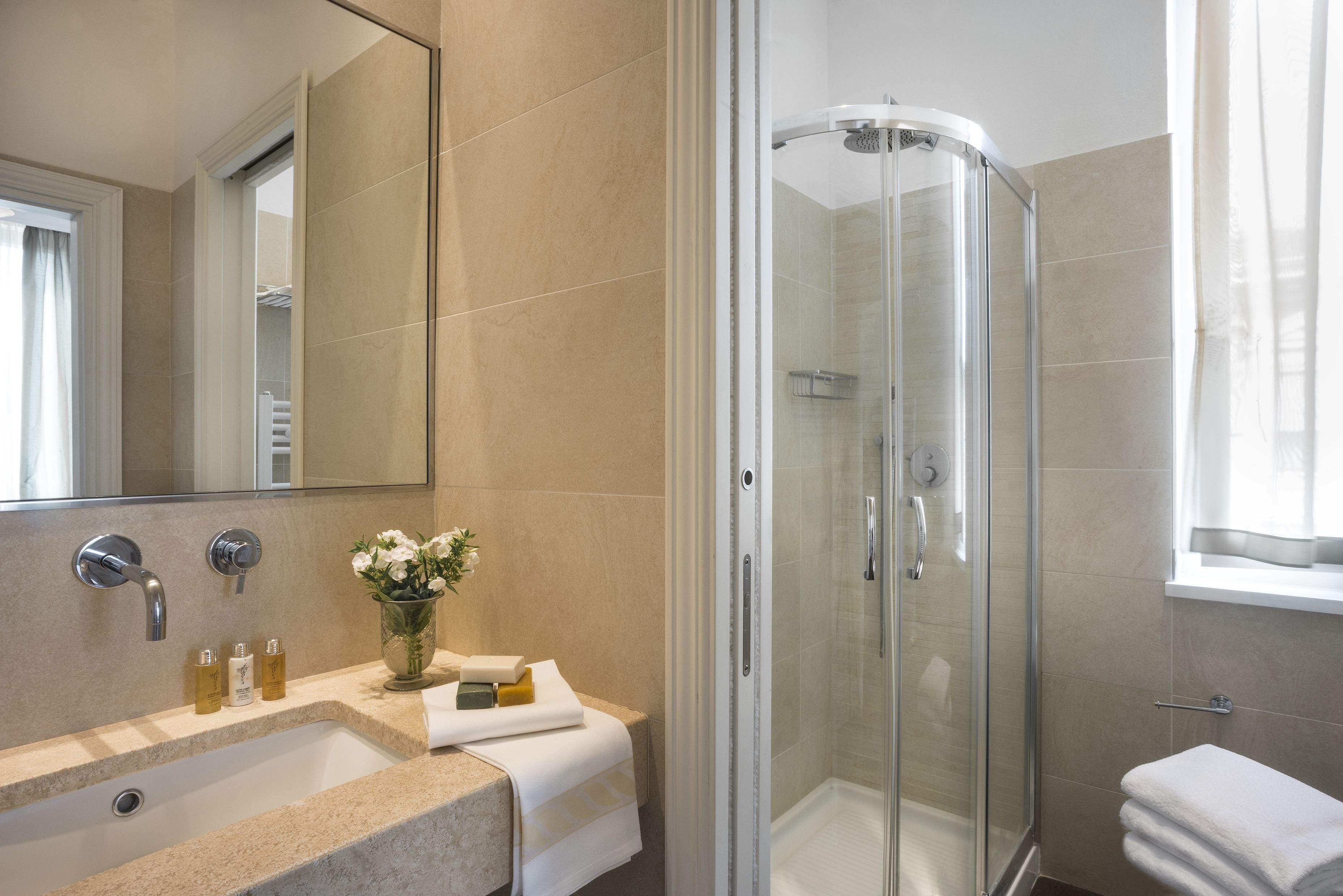 superior double room | bathroom | shower, rainfall showerhead, free toiletries, hair dryer