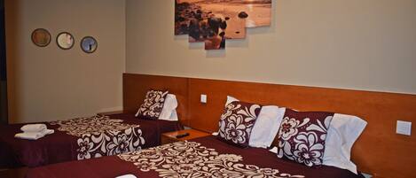 Triple Room, Private Bathroom | Free WiFi, bed sheets