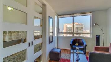 Family Apartment, 2 Bedrooms, Pool Access | Living area | TV