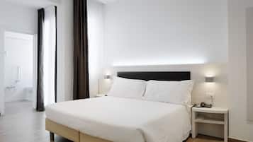 Premium bedding, down comforters, minibar, in-room safe