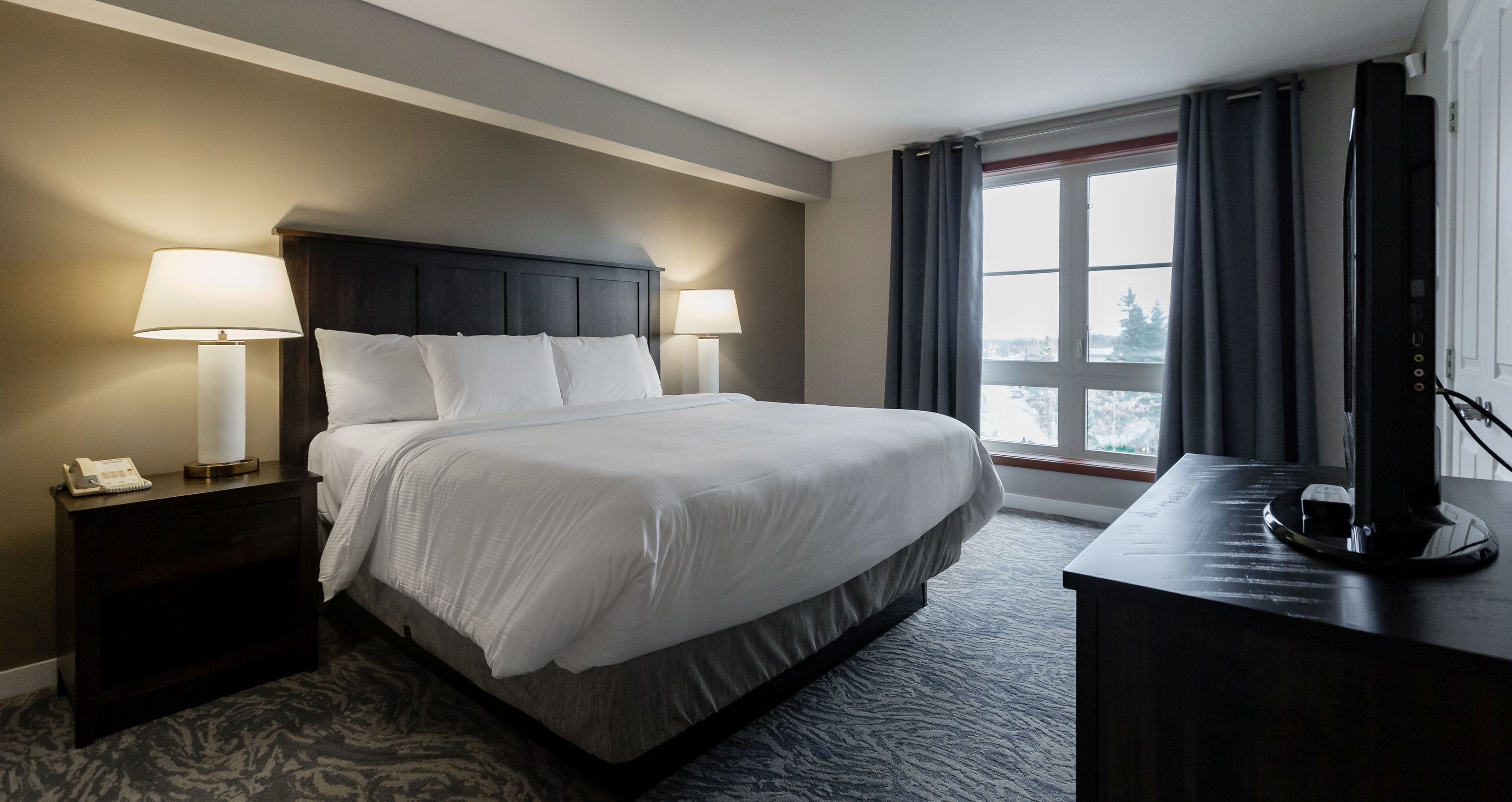 village suites two bedroom with kitchen | laptop workspace, blackout curtains, iron/ironing board, free wifi