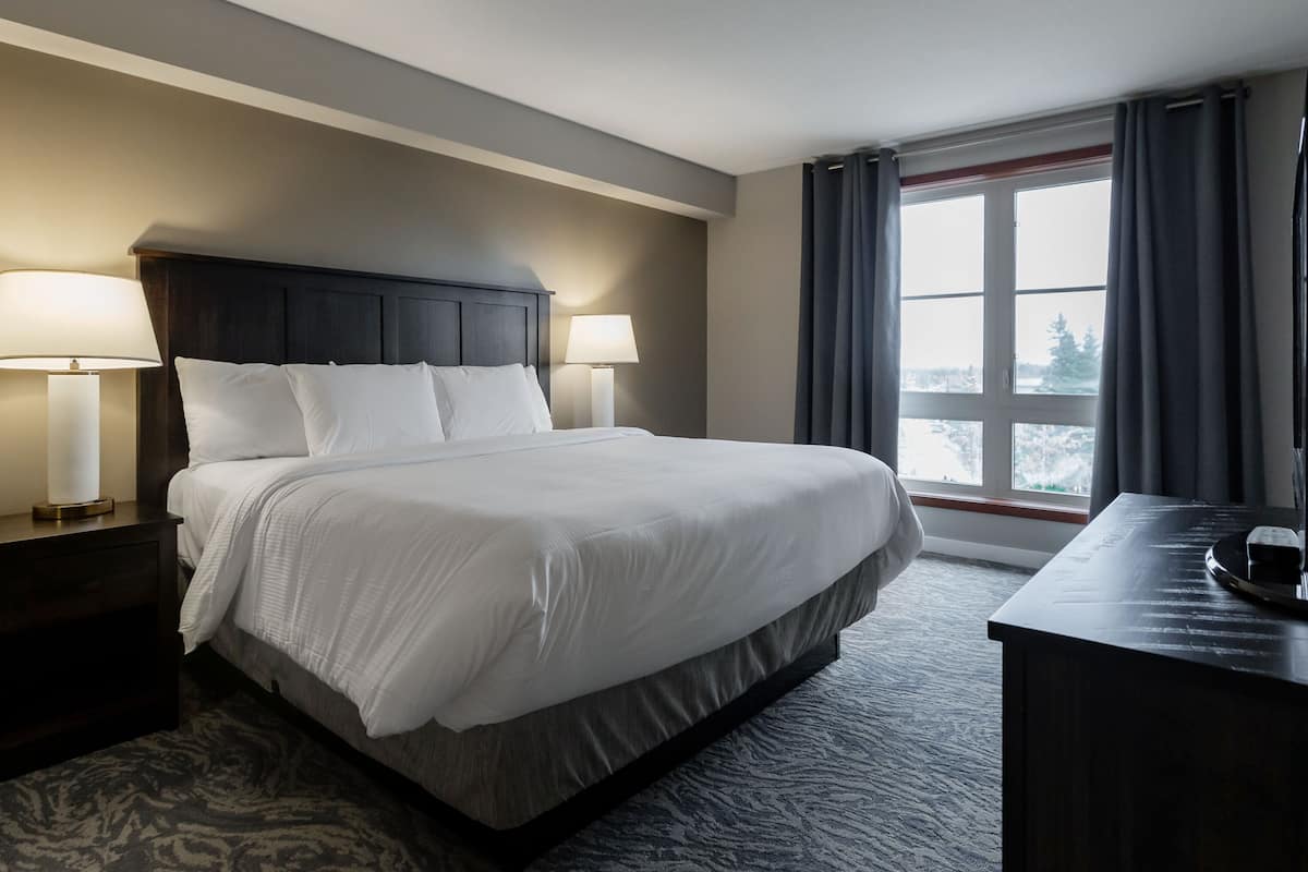 village suites two bedroom with kitchen | laptop workspace, blackout curtains, iron/ironing board, free wifi