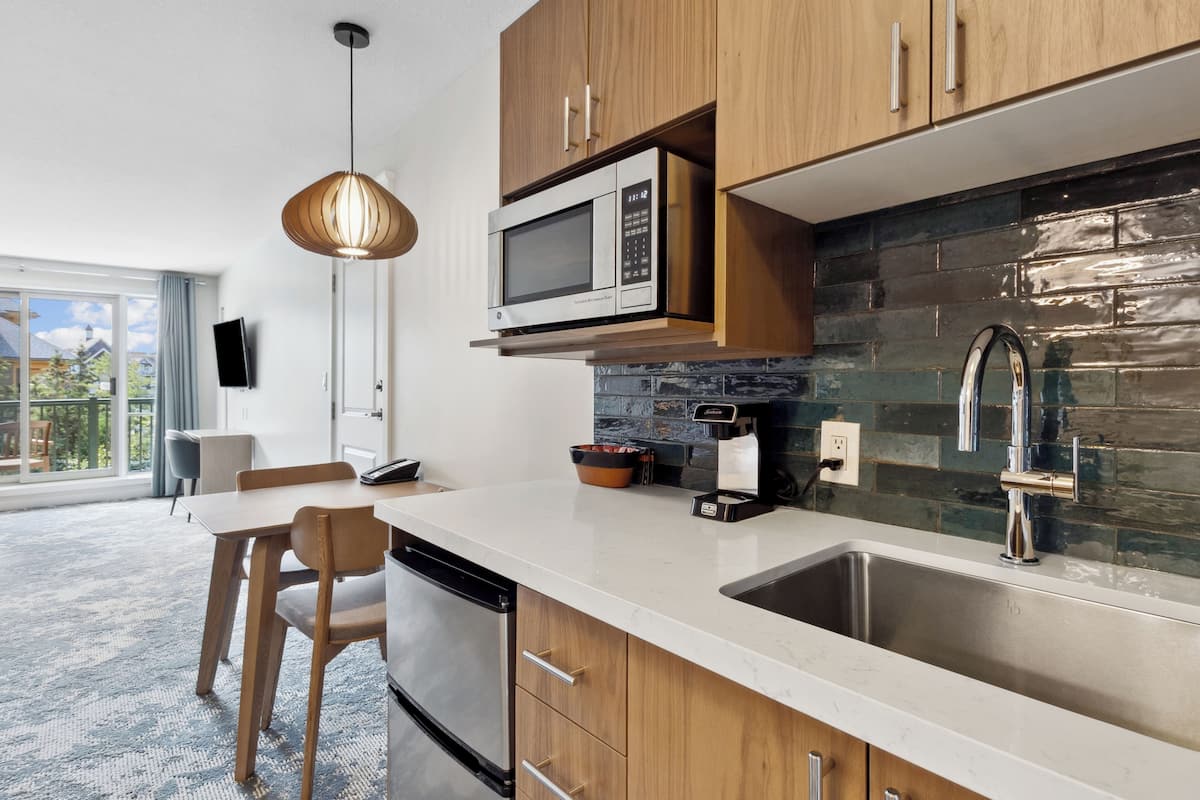 studio suite, kitchenette (village) | laptop workspace, blackout curtains, iron/ironing board, free wifi