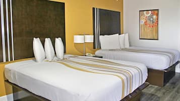 Premium bedding, desk, laptop workspace, blackout curtains