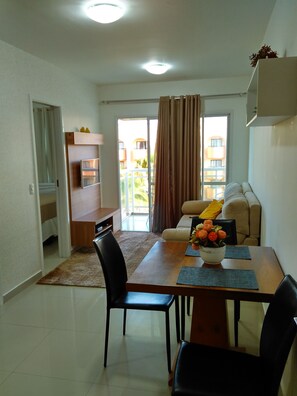 Basic Apartment, 1 Bedroom, Garden View | Living room | 32-inch LCD TV with cable channels, TV - VG Fun Beach Front Apartamentos (Fortaleza)