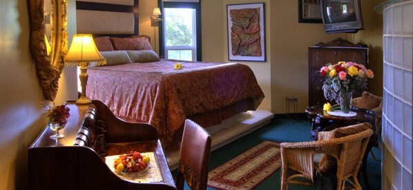 Tabla de planchar con plancha, wifi gratis y ropa de cama 