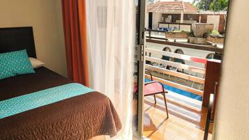 Habitación doble estándar, vista a la alberca | Vista desde la habitación
