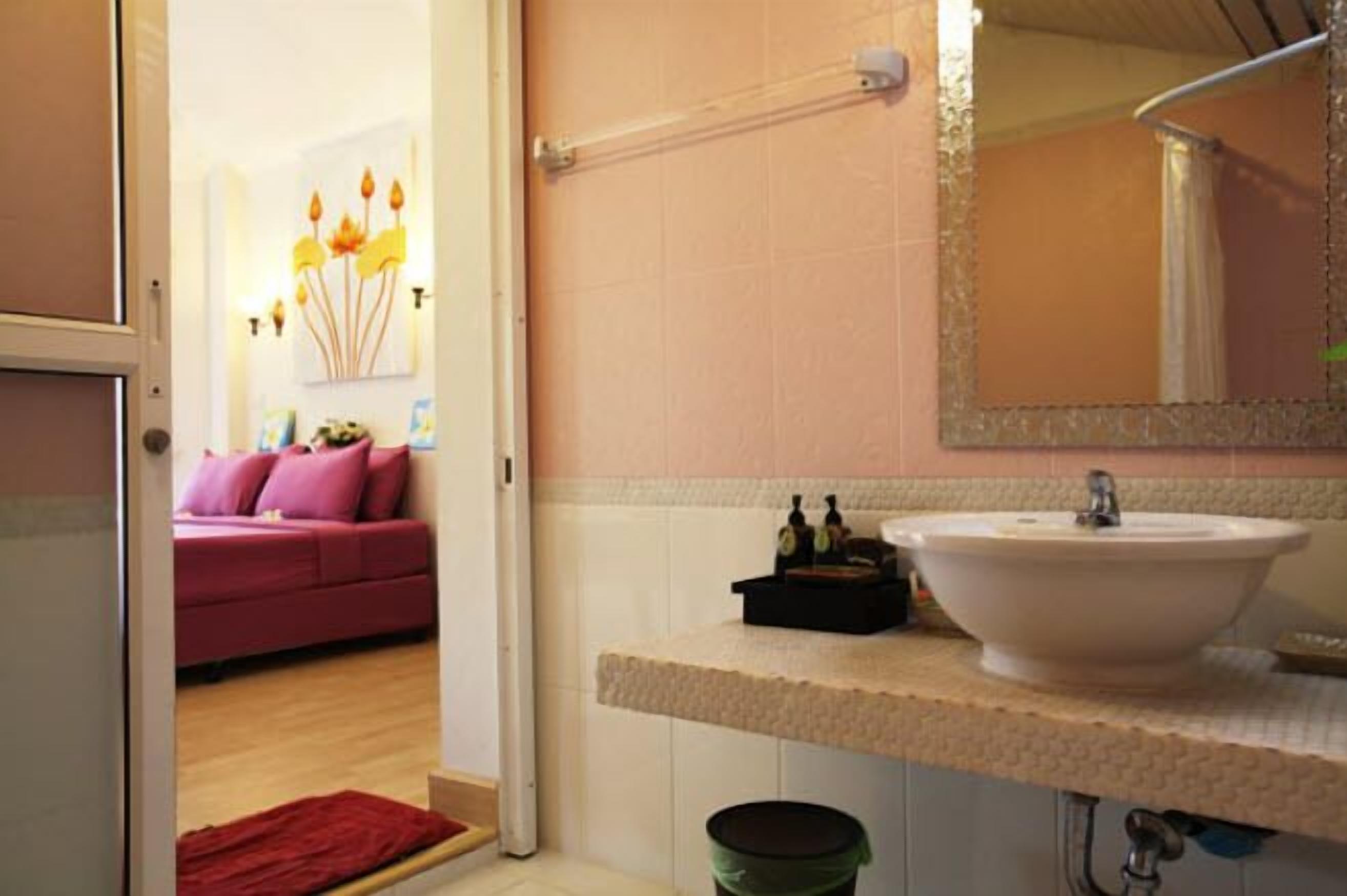beach front deluxe cottage  | bathroom | shower, free toiletries, hair dryer, slippers