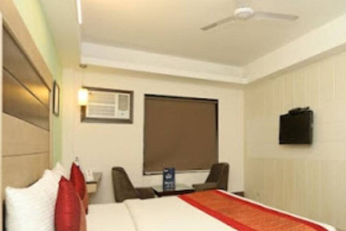 Chambre Double Deluxe, 1 très grand lit | Minibar, coffres-forts dans les chambres, bureau, chambres insonorisées