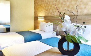 Ropa de cama de alta calidad y minibar 