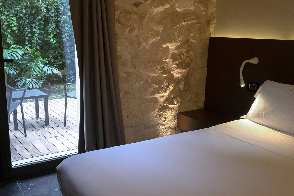 superior room, patio | 1 bedroom, down duvets, minibar, in-room safe