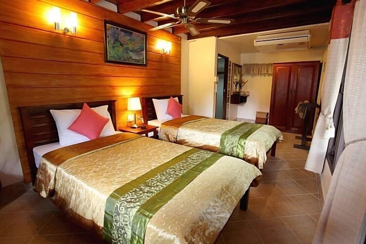 Deluxe Twin (Ground floor) | Brankas, meja kerja, tempat tidur lipat/tambahan, dan Wi-Fi gratis