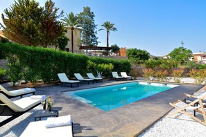 Outdoor pool, pool loungers