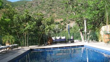 Outdoor pool, pool umbrellas, pool loungers