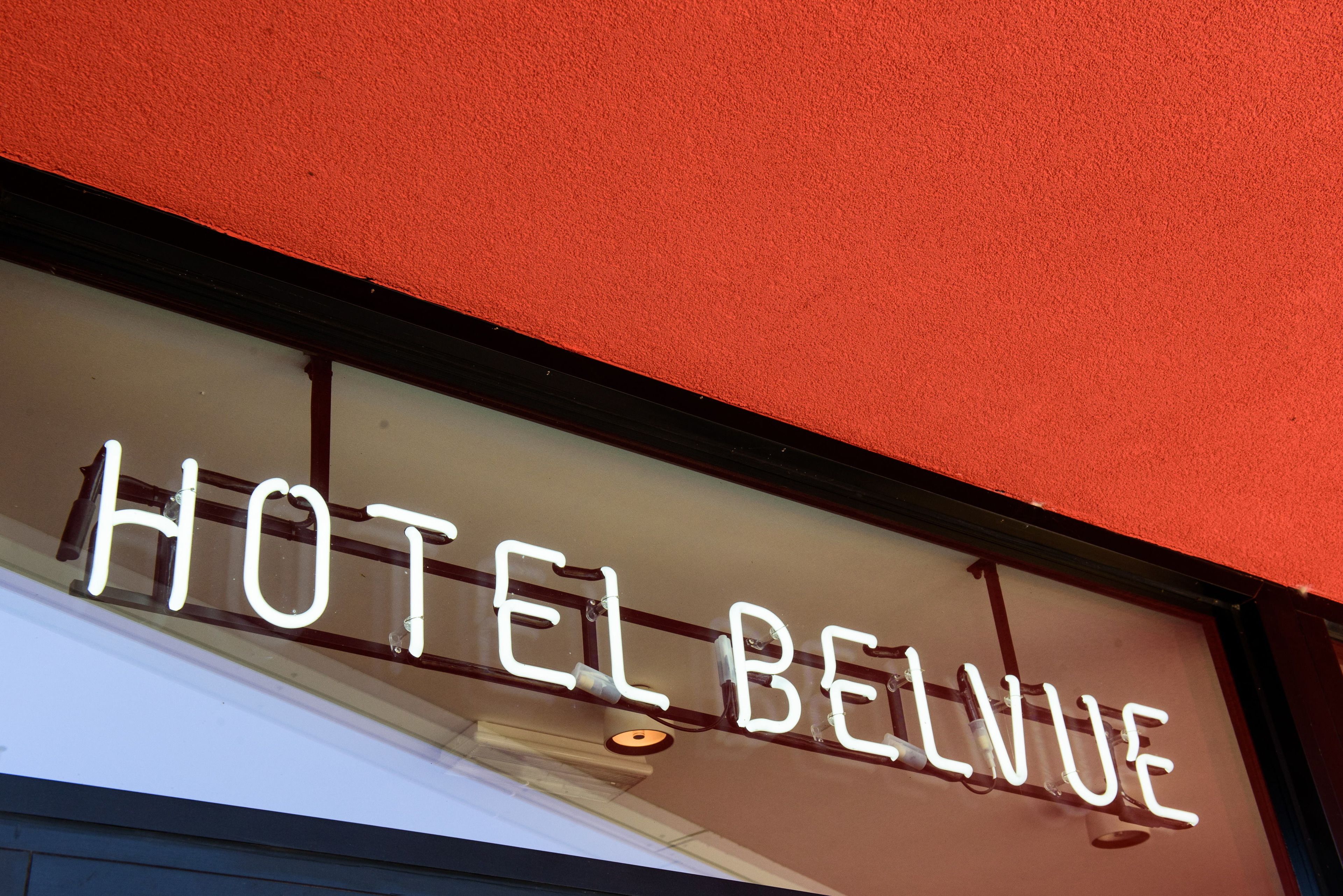 A hotel sign with the name "HOTEL BELVUE".