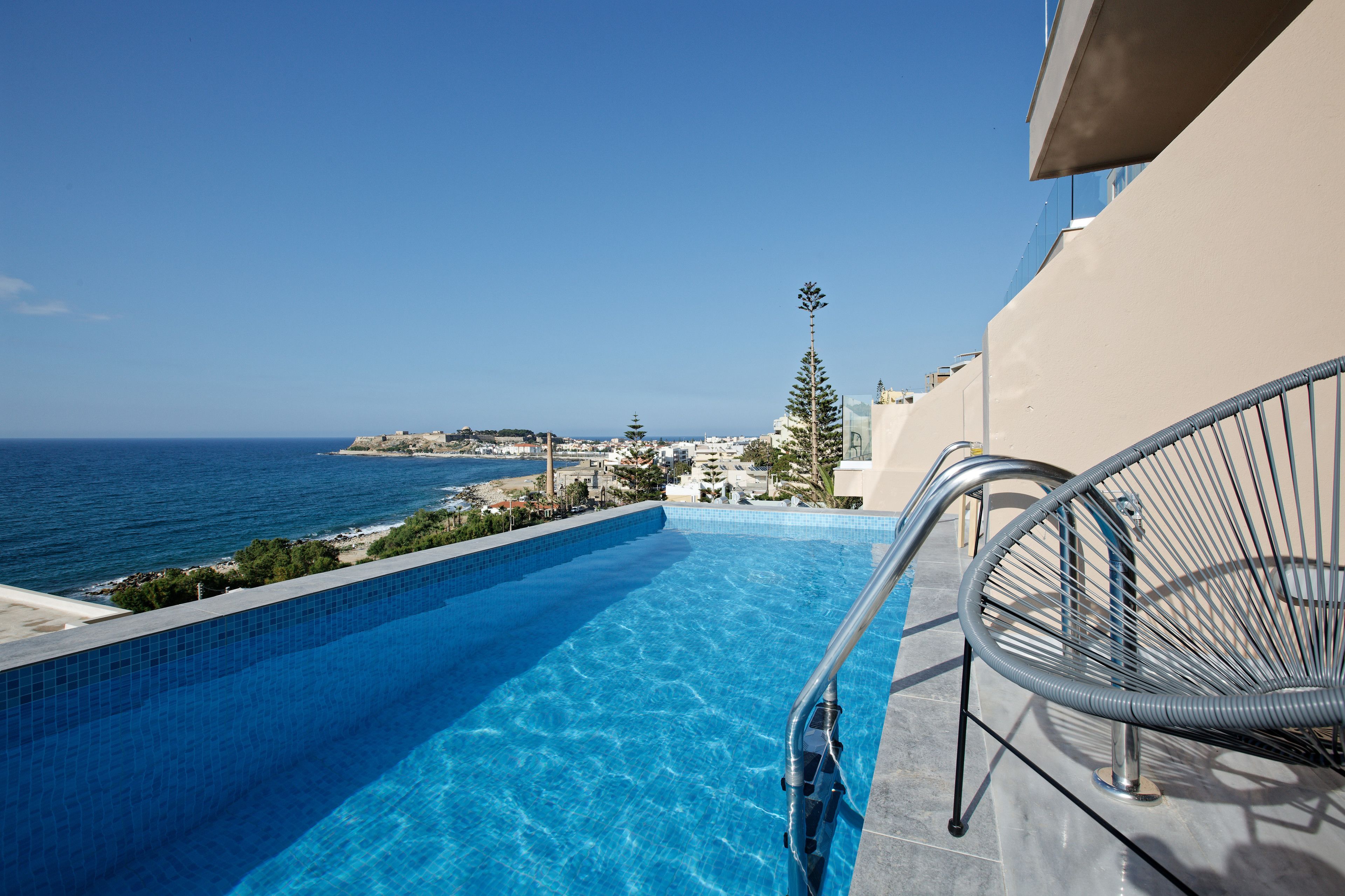 seasonal outdoor pool, open 9:00 am to 9:00 pm, pool umbrellas