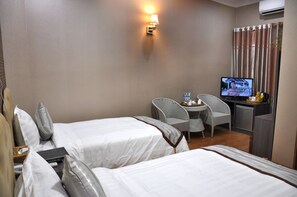 Chambre supérieure double | Minibar, coffre-fort, bureau, rideaux d’obscurcissement
