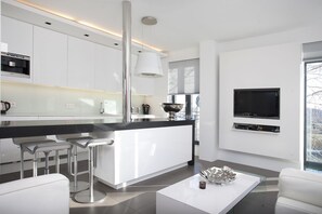 Appartement luxueux | Aire de séjour | Téléviseur à écran plat