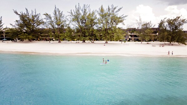Private beach, white sand, sun loungers, beach towels