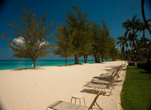 Private beach, white sand, sun loungers, beach towels